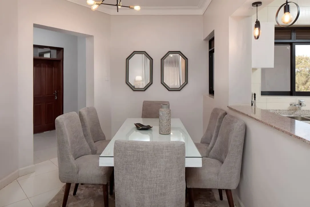Iotaville dining area with open-plan kitchen pass-through